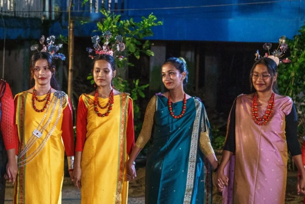 Khasi women wearing traditional clothing during a cultural event in Jaflong